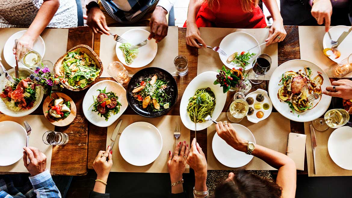 Friends gathered at dinner table