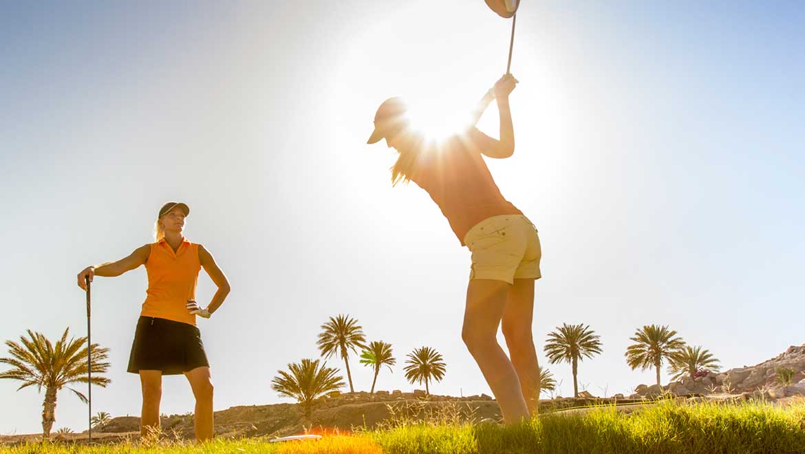 Women golfing (Decorative Image)