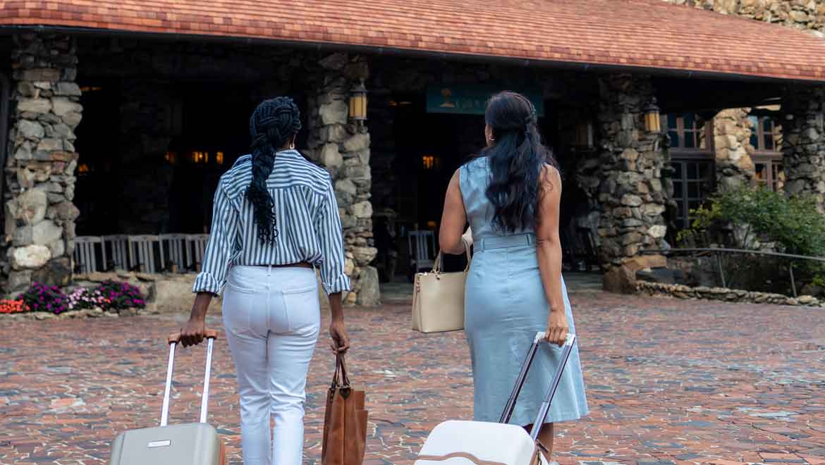Two women entering the resort.